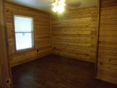 Attractive, log type home sitting on three lots, fenced,  with