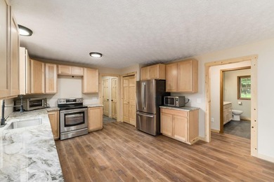 **Agent Owned** Taken down to the studs and rebuilt. This 3-bed - photo 17