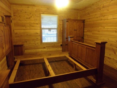 Attractive, log type home sitting on three lots, fenced,  with