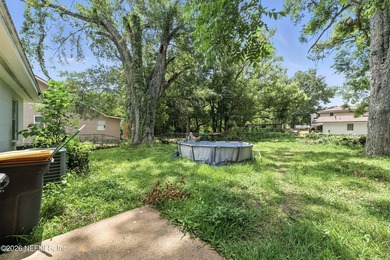 HUGE PRICE IMPROVEMENT on this 4-bedroom, 2-bath home is full of - photo 18