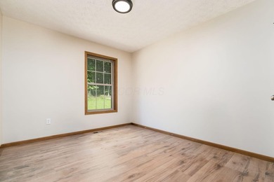 **Agent Owned** Taken down to the studs and rebuilt. This 3-bed - photo 22