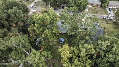 HUGE PRICE IMPROVEMENT on this 4-bedroom, 2-bath home is full of - photo 23