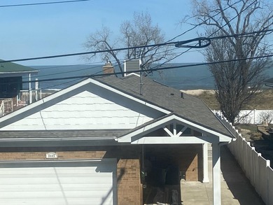 Located just steps from the beach, a quick commute to Chicago - photo 33