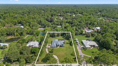 Welcome to 11414 169th Court N, a beautifully maintained - photo 1