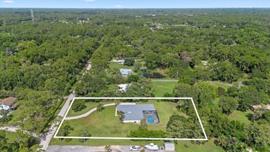 Welcome to 11414 169th Court N, a beautifully maintained - photo 2
