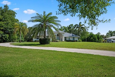 Welcome to 11414 169th Court N, a beautifully maintained - photo 3