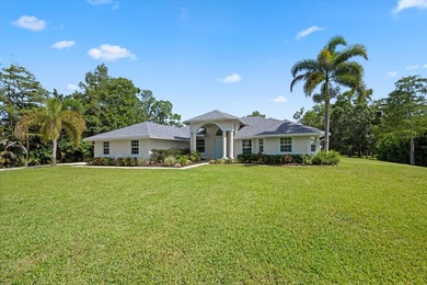 Welcome to 11414 169th Court N, a beautifully maintained - photo 4