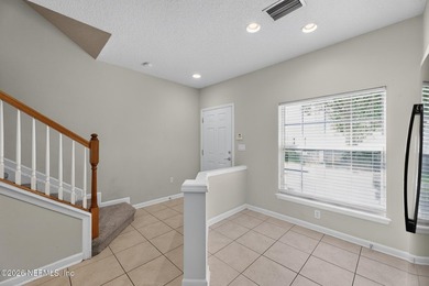 This move-in ready 2-bedroom, 2.5-bath Jacksonville home is - photo 3