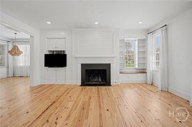 Located within the prestigious Ford Field and River Club in the - photo 9