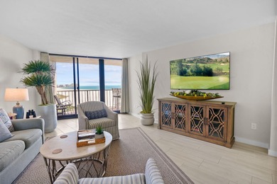 Indulge in luxury coastal living with this bright and - photo 2