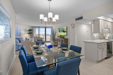 Indulge in luxury coastal living with this bright and - photo 3