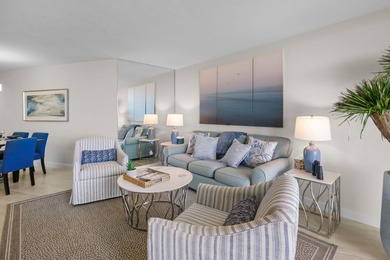 Indulge in luxury coastal living with this bright and - photo 9