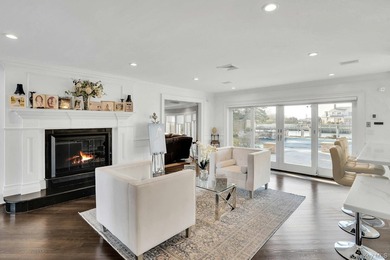 Privately gated, prestigious waterfront home in the heart of - photo 12