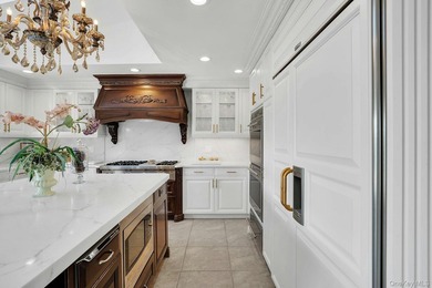 Privately gated, prestigious waterfront home in the heart of - photo 18
