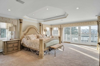 Privately gated, prestigious waterfront home in the heart of - photo 29