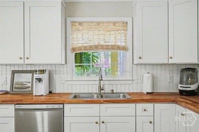 Welcome to this adorable, updated cottage in The Landings on - photo 9