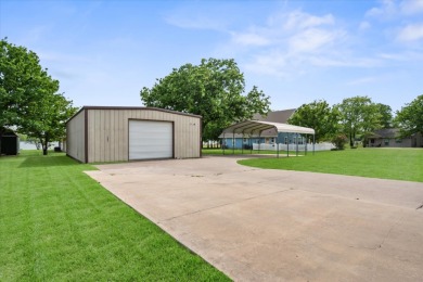 3/2 on 0.9 acres Waterfront w/shop, no HOA! - photo 3