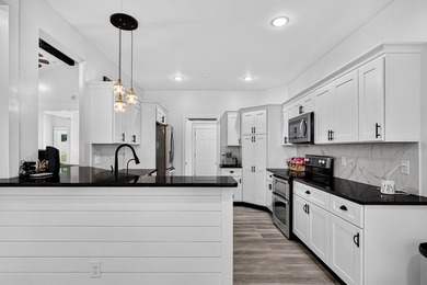 Built in 2024 and loaded with upgrades, this move-in-ready - photo 13