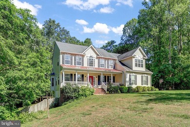 Welcome to 1 Rolling Brooke Ct, a beautiful Colonial set on 3.1 - photo 2