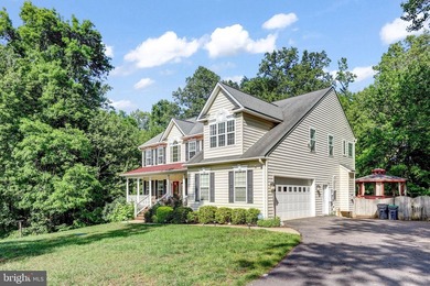 Welcome to 1 Rolling Brooke Ct, a beautiful Colonial set on 3.1 - photo 3