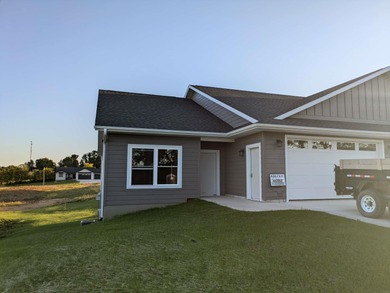 Enjoy easy living in this condo currently under construction in