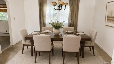 Set on a level half-acre along one of Cold Spring Hills' most - photo 6