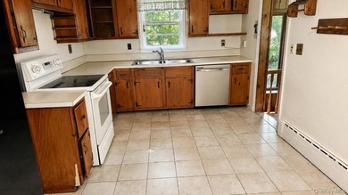 Set on a level half-acre along one of Cold Spring Hills' most - photo 7