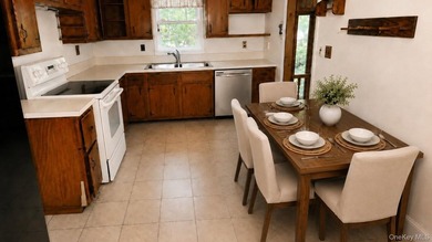 Set on a level half-acre along one of Cold Spring Hills' most - photo 8