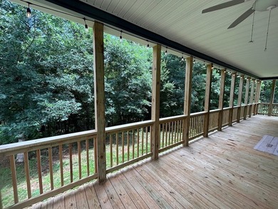Experience year-round vacation living on this stunning 12-acre - photo 4