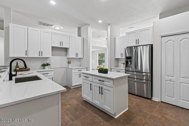 Beautifully renovated 3-bedroom, 2-bath home with a 2-car garage - photo 10