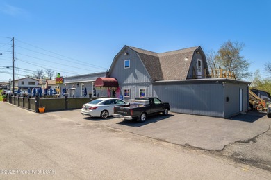 This 5,100 SQ. FT. building sits on a two-acre lot just outside