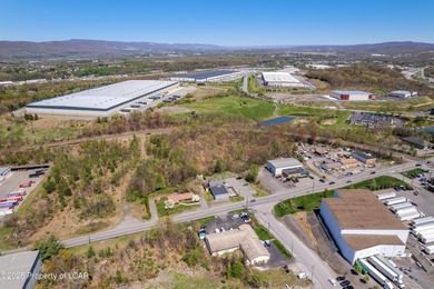 This 5,100 SQ. FT. building sits on a two-acre lot just outside