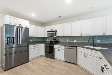 This modern, updated home on Whitemarsh Island is a true - photo 14