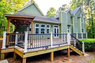 Nestled on over half an acre with exceptional privacy, this - photo 5