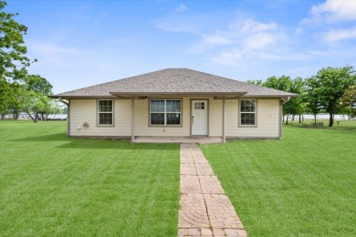 3/2 on 0.9 acres Waterfront w/shop, no HOA! - photo 2