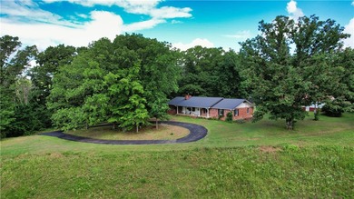 Looking for land with a home? Here is a rare opportunity to own - photo 1