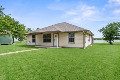 3/2 on 0.9 acres Waterfront w/shop, no HOA! - photo 1