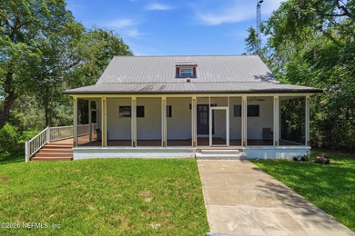 Bright and open living concept in this spacious lake home! The - photo 2