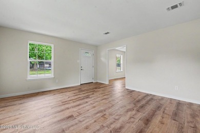 HUGE PRICE IMPROVEMENT! Your search ends here! Renovated home in - photo 4
