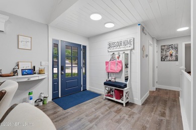 Bright and open living concept in this spacious lake home! The - photo 4