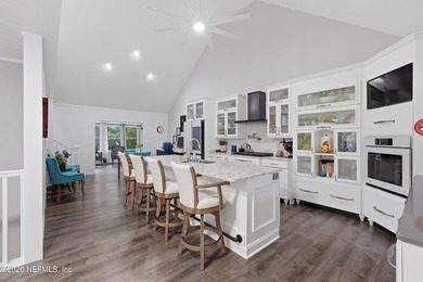 Bright and open living concept in this spacious lake home! The - photo 5