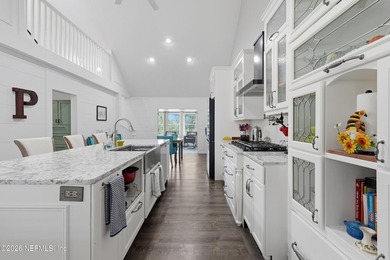 Bright and open living concept in this spacious lake home! The - photo 8