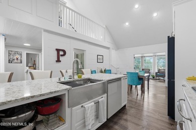 Bright and open living concept in this spacious lake home! The - photo 9