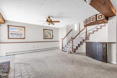 Start your summer 2026 in this prime bay front bi-level nestled - photo 11