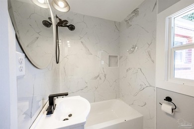 Turnkey and fully renovated! Welcome to 402 Rue Max St., a - photo 11