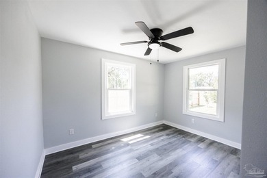 Turnkey and fully renovated! Welcome to 402 Rue Max St., a - photo 16