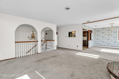 Start your summer 2026 in this prime bay front bi-level nestled - photo 18