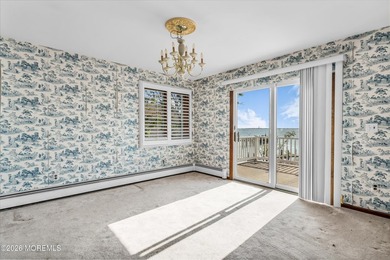 Start your summer 2026 in this prime bay front bi-level nestled - photo 19