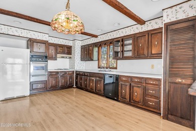 Start your summer 2026 in this prime bay front bi-level nestled - photo 21