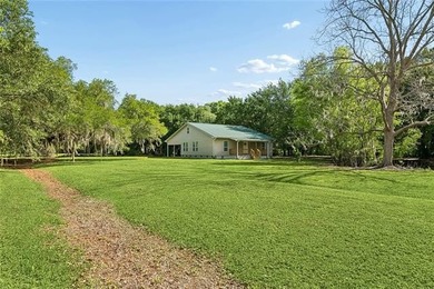 Situated on 2.09 acres off of Historic Bayou Road, one of the - photo 1